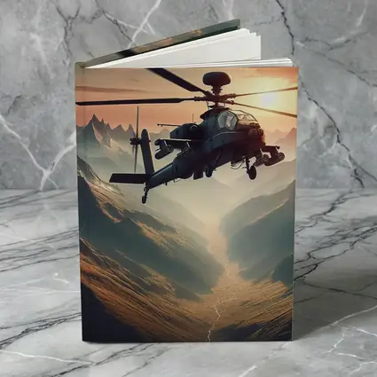Military Apache Helicopter Flying Over Mountain Valley
