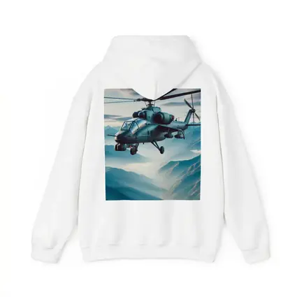 Military Attack Helicopter Flying Over Mountain Landscape