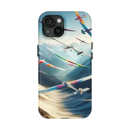 Colorful Gliders Soaring Over Snowy Mountains