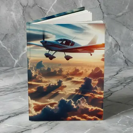 Small Plane Flying Above Golden Sunset Clouds