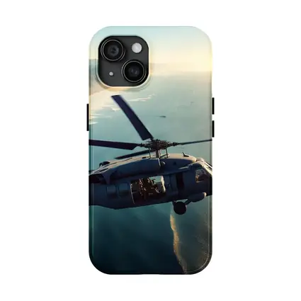 Military Helicopter Flying Over Coastal Shoreline