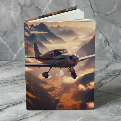 Small Propeller Plane Flying Over Mountains