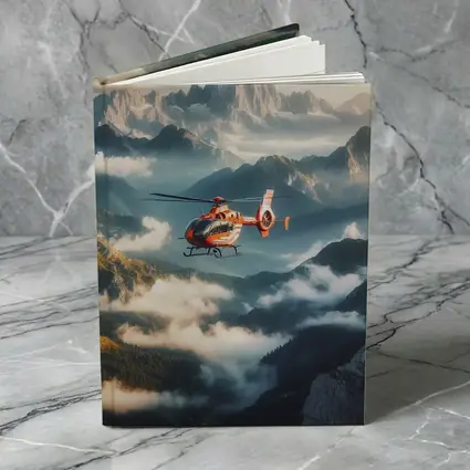 Orange Helicopter Flying Over Misty Mountains