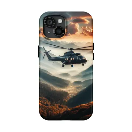 Military Helicopter Flying Over Mountain Valley