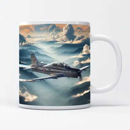 Military Jet Flying Above Misty Mountains