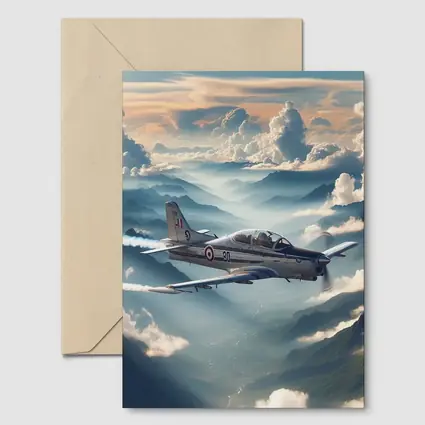 Military Jet Flying Above Misty Mountains