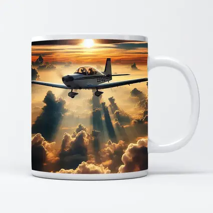 Small Airplane Flying Above Sunset Clouds