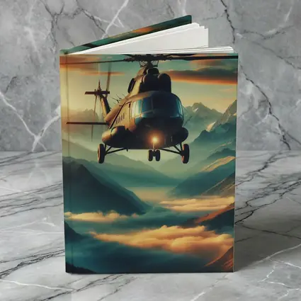 Military Helicopter Flying Over Mountain Clouds