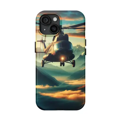 Military Helicopter Flying Over Mountain Clouds