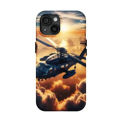 Military Helicopter Flying Above Golden Sunset Clouds