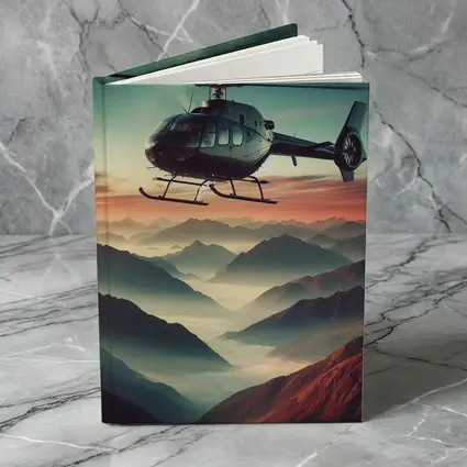 Helicopter Flying Over Misty Mountain Sunset