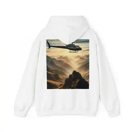 Helicopter Flying Over Misty Mountain Range