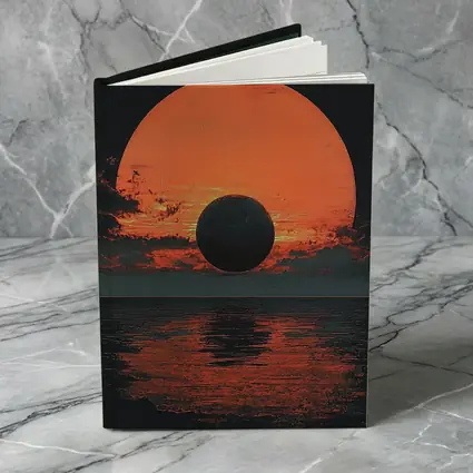 Dark Eclipse Over Red Ocean Sunset
