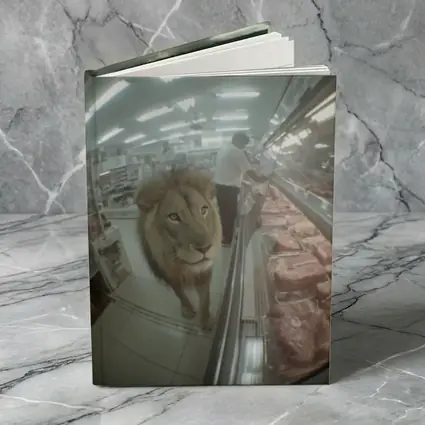 Lion Walking Through Supermarket Meat Aisle