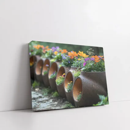 Rustic Stone Planters With Colorful Garden Flowers