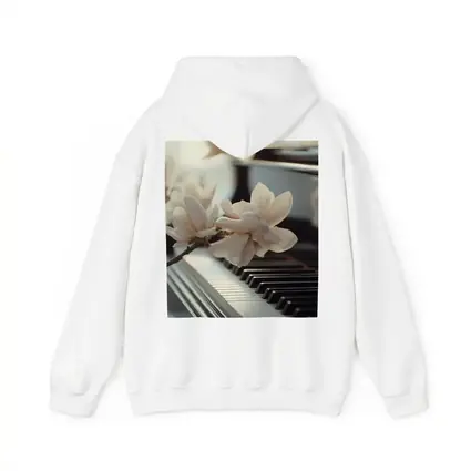 Magnolia Branch Resting On Grand Piano Keys