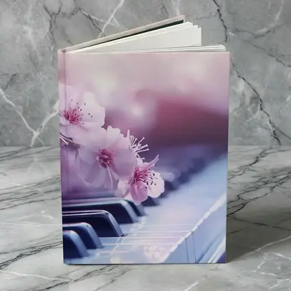 Cherry Blossoms Resting On Piano Keys