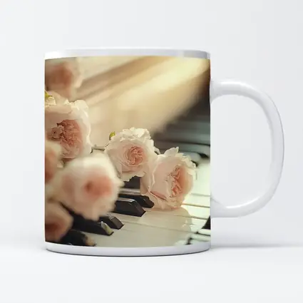 Pink Roses Resting On Piano Keys