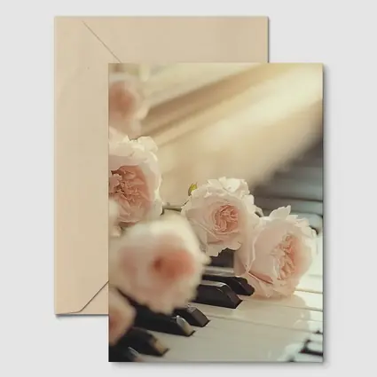 Pink Roses Resting On Piano Keys