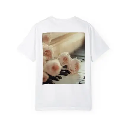 Pink Roses Resting On Piano Keys