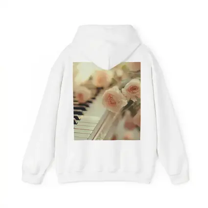 Pink Roses Resting On White Piano Keys