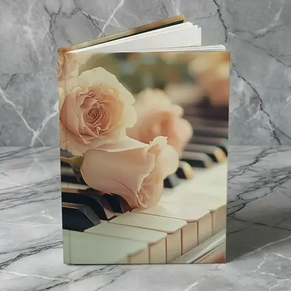 Pink Roses Resting On Piano Keys