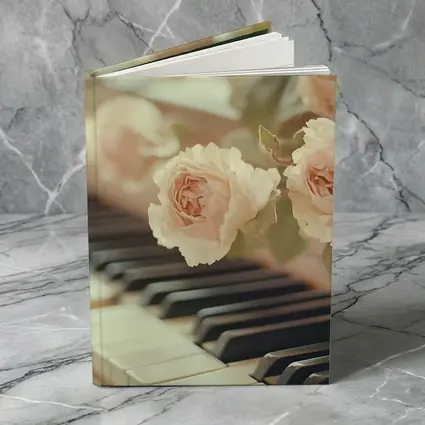 Pink Roses Resting On Piano Keys