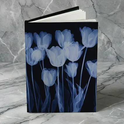 Blue Tulips Glowing On Dark Background