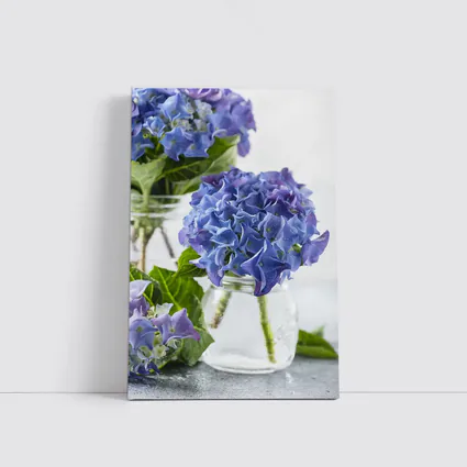 Blue Hydrangea Flowers In Glass Jars