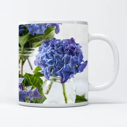 Blue Hydrangea Flowers In Glass Jars