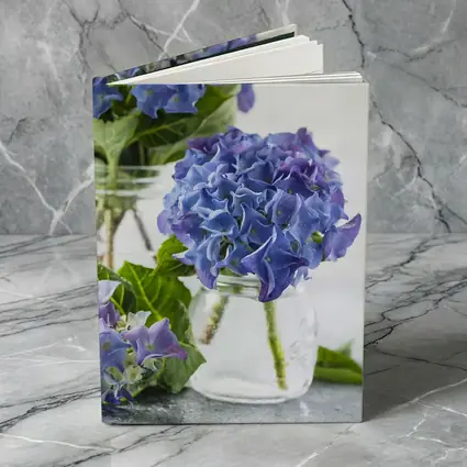 Blue Hydrangea Flowers In Glass Jars