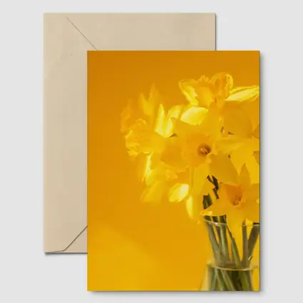 Yellow Daffodils In Glass Vase Golden Background
