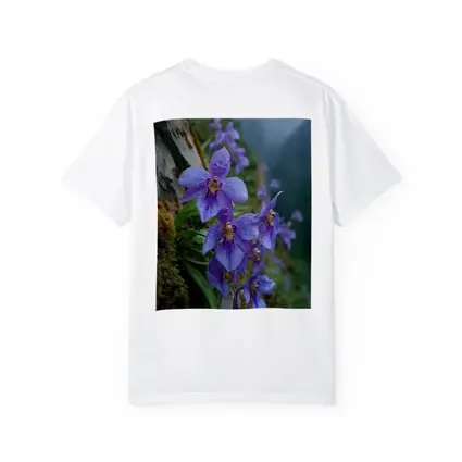 Purple Orchids Growing on Misty Mountain Cliff