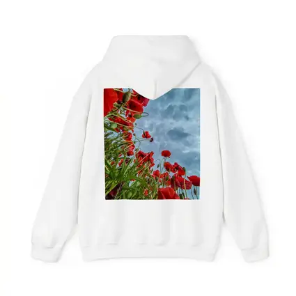 Red Poppies Field Against Cloudy Sky
