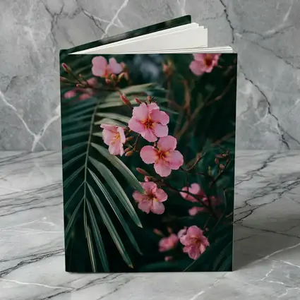 Pink Oleander Flowers Among Green Palm Leaves