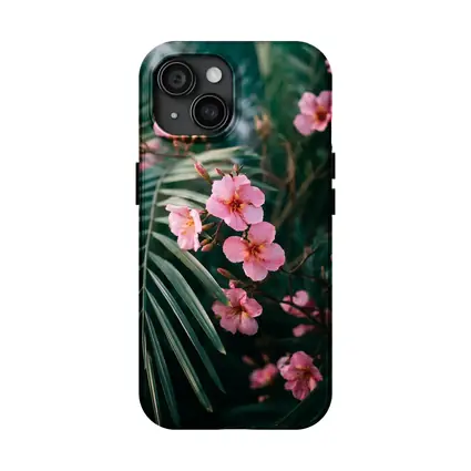 Pink Oleander Flowers Among Green Palm Leaves