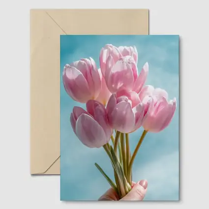 Pink Tulips Bouquet Against Blue Sky