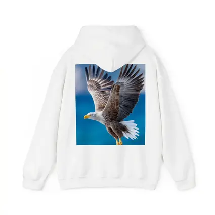 Bald Eagle Flying Over Blue Sky