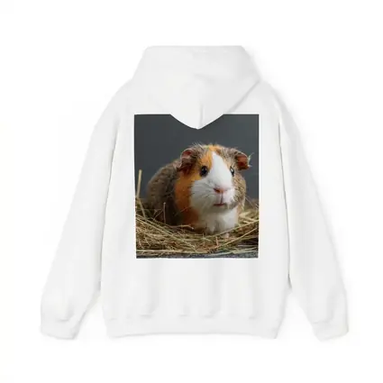Tricolor Guinea Pig Sitting In Hay