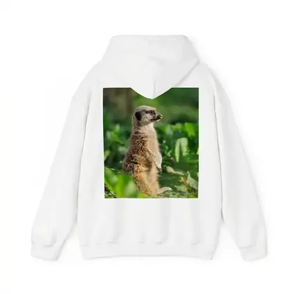 Meerkat Standing Alert In Green Foliage