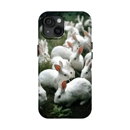 White Rabbits Grazing on Green Grass