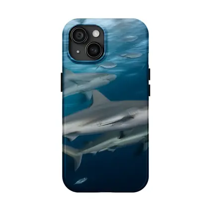Sharks Swimming Together in Deep Blue Ocean
