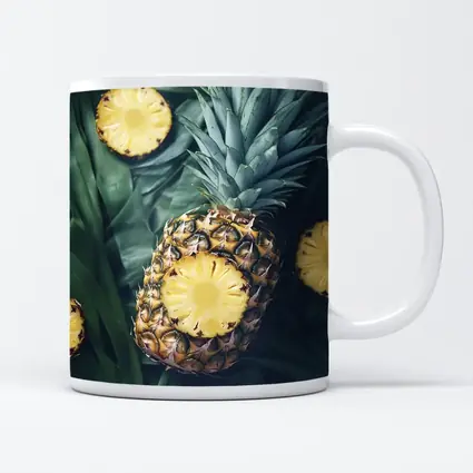 Pineapple Slices On Tropical Palm Leaves