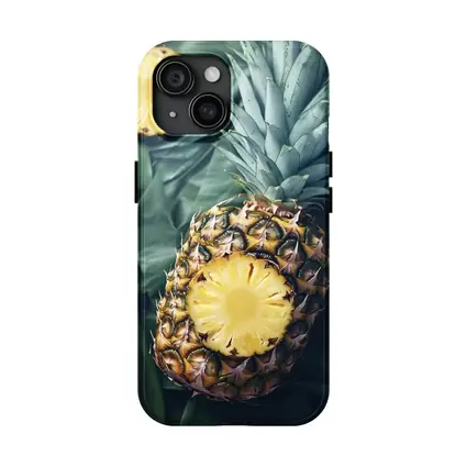 Pineapple Slices On Tropical Palm Leaves
