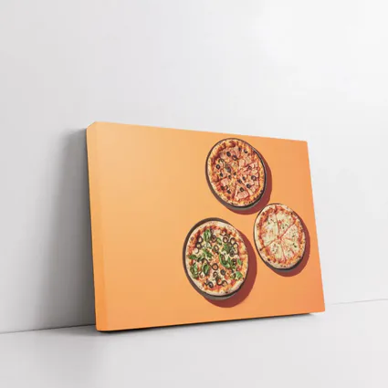 Three Pizzas Flat Lay Orange Background