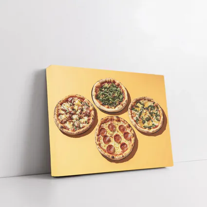 Four Neapolitan Pizzas On Yellow Background