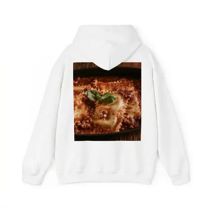 Ravioli Bolognese With Fresh Basil Garnish