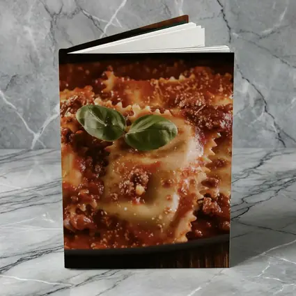 Ravioli Bolognese With Fresh Basil Garnish
