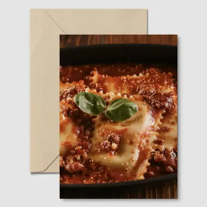 Ravioli Bolognese With Fresh Basil Garnish