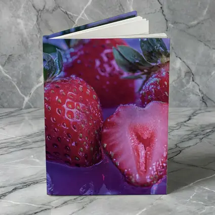 Fresh Strawberries on Blue Purple Background